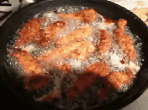 Fried Chicken Cooking in Hot Oil
